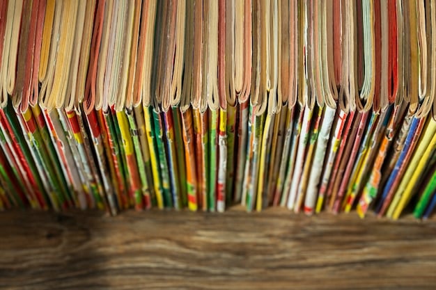 A well-organized collection of graded comic books displayed in protective Mylar sleeves and sturdy cardboard backing boards, stored neatly in a comic book storage box. The focus is on the archival quality of the storage materials and the neat arrangement of the comics.