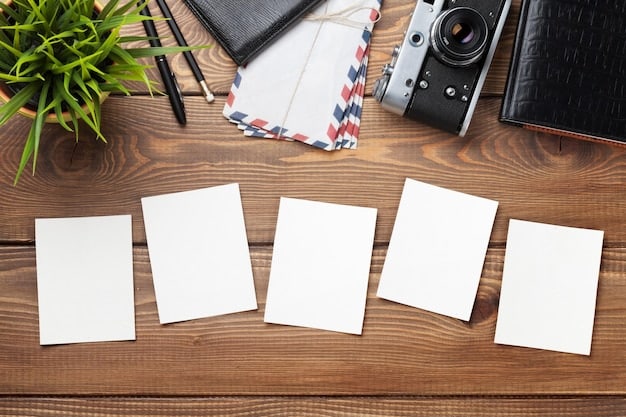 Close-up shot of multiple K-Pop photocards laid out on a table. Each photocard features a different member of the group in various poses and outfits, highlighting the collectible aspect of K-Pop albums. The background is blurred to emphasize the photocards.