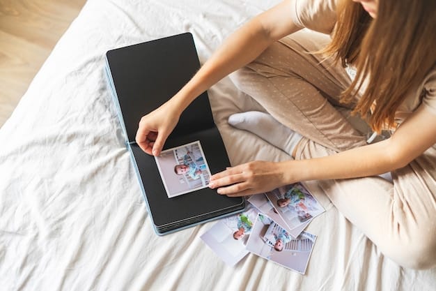 A K-Pop fan organizing their photocard collection in a binder. The binder is filled with plastic sleeves, each containing a different photocard. The fan is seen carefully placing a new photocard into the binder, showcasing the dedication to collecting these items.