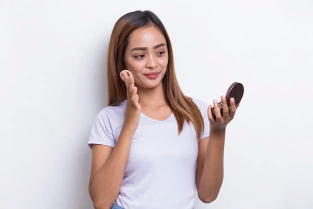A close-up image showcasing a woman applying cushion foundation with a makeup sponge, emphasizing the light and even coverage for a K-Pop inspired base.