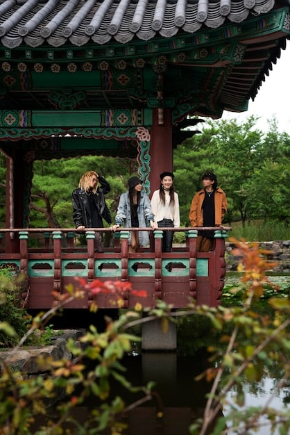 A still from a popular K-drama showcasing a traditional Korean setting, such as a hanok (traditional Korean house) or a scene set during a cultural festival. The image highlights the visual appeal and cultural richness of K-dramas.