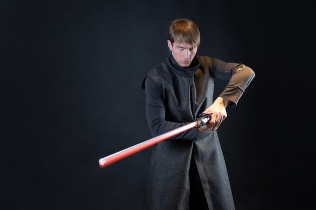 A cosplayer dressed as a Jedi from Star Wars, holding a lightsaber and wearing a detailed Jedi robe, showcasing the dedication to craftsmanship and character accuracy.