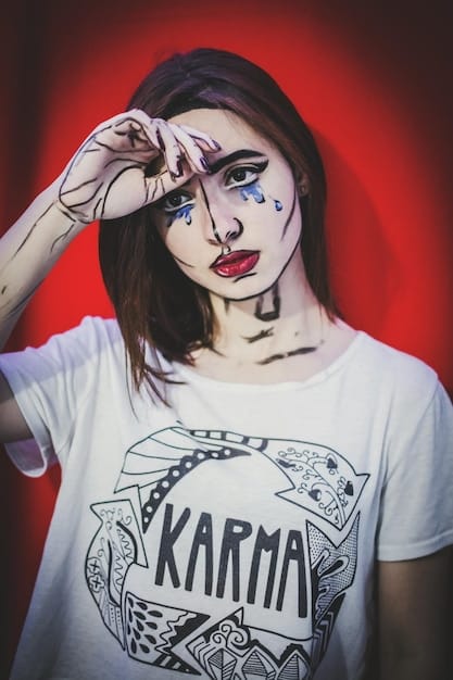 Close-up shot of a person wearing a graphic tee with an abstract design inspired by a popular sci-fi movie. The tee features a blend of vibrant colors and geometric shapes, creating a modern and artistic representation of the film's theme. The fabric is soft and comfortable, perfect for everyday wear.