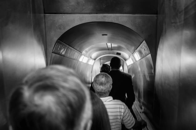 A dizzying view inside the City Museum, showing winding tunnels, repurposed industrial equipment, and children and adults climbing and exploring.