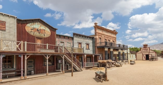 The main street of Bisbee, Arizona, featuring colorful Victorian buildings, art galleries, and antique shops, showcasing the town's steampunk vibe.