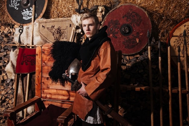 A close-up shot of a cosplayer meticulously painting details on a prop weapon. The background is a cluttered workshop filled with tools and materials.