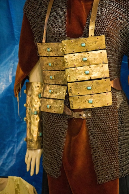 A close-up shot of a cosplayer's incredibly detailed armor, showcasing intricate craftsmanship and design.