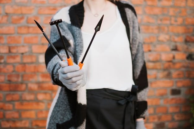 A close-up shot of a cosplayer meticulously crafting a prop weapon, showing attention to detail with various tools and materials.