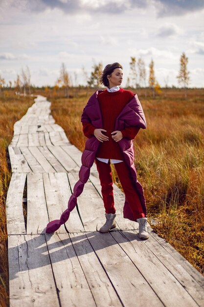 A person wearing an adaptive cosplay outfit made from soft, comfortable materials. The outfit allows for easy movement and adjustment, showcasing its functionality and inclusivity.