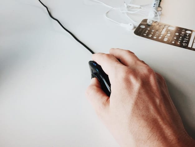 A close-up of someone using a soldering iron to connect wires to an LED strip, with a partially assembled lightsaber hilt in the background. The focus is on the precision and attention to detail required for the electronics assembly.