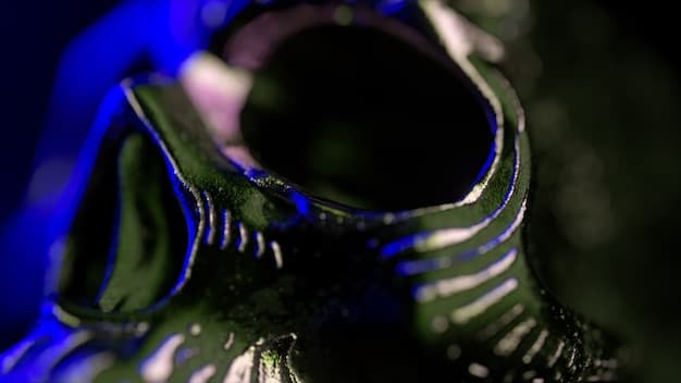 A close-up shot of a cosplayer's intricately crafted armor, highlighting the details and textures of the materials used. LED lights are incorporated into the design, creating a glowing effect.