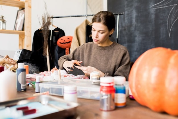 A cosplayer working on a detailed prop in their workshop, surrounded by tools, materials, and reference images. The focus is on the cosplayer's hands as they carefully assemble the prop.
