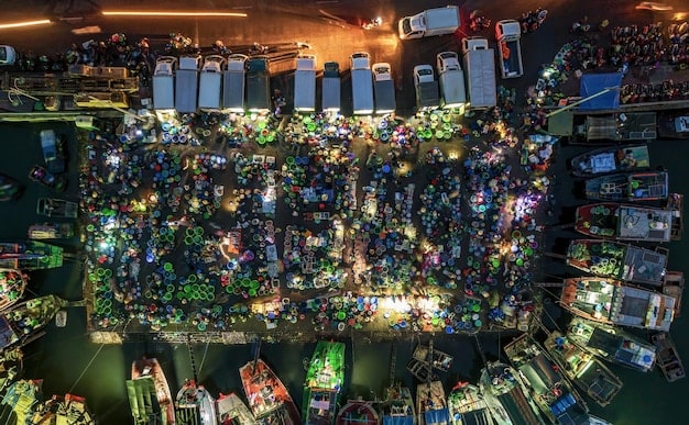 A panoramic view of a large gaming convention, filled with rows of computers, consoles, and enthusiastic gamers competing in various tournaments.