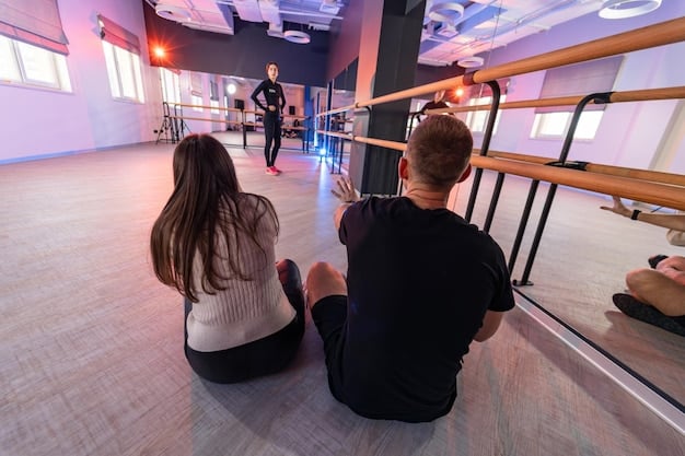 A candid shot of trainees practicing dance moves in a K-Pop entertainment company's studio, with instructors providing feedback, demonstrating the rigorous training process artists undergo.
