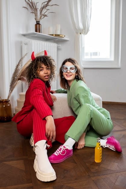 Three young adults wearing trendy K-Pop inspired outfits from YesStyle are posing in a modern apartment. The outfits include a mix of streetwear elements, pastel colors, and unique accessories.