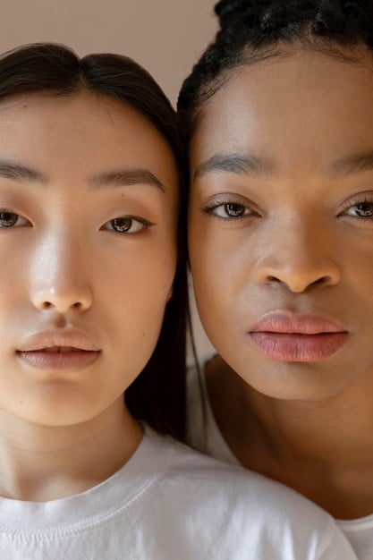 A close-up shot of a diverse group of Korean women with different skin tones and facial features, smiling confidently. They are showcasing natural makeup looks that emphasize their unique characteristics rather than conforming to traditional beauty standards.