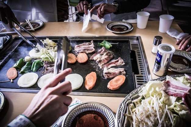 A sizzling Korean BBQ grill with various marinated meats (beef bulgogi, pork belly) being cooked, surrounded by small side dishes (banchan) in a lively, modern Korean restaurant setting.