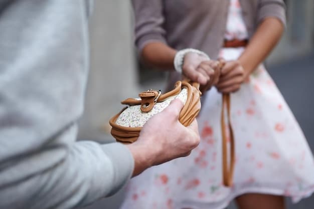A close-up of hands exchanging wedding rings during a Korean wedding ceremony. The focus is on the intricate designs of the rings and the traditional attire worn by the couple.