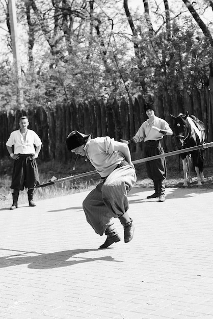Group of Taekwondo practitioners in the 1960s training at a South Korean military base, showcasing early training methods.