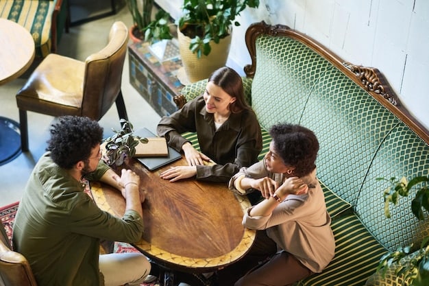 A team of Korean and American professionals gathered around a table in a casual setting after work, possibly at a 