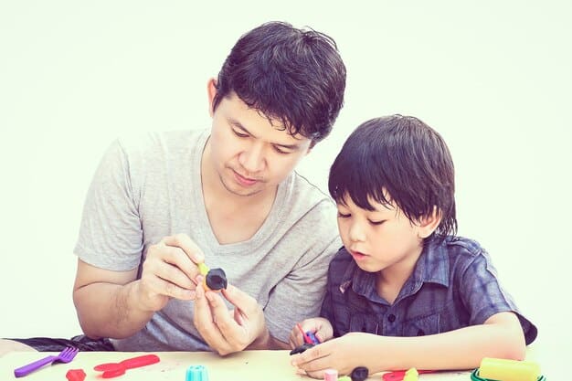 A father helping his son with his homework, showcasing the dedication Korean parents have towards their children’s education.