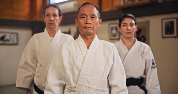 A group photograph of the founders of the major Taekwondo Kwans (schools) in the mid-20th century, in a formal setting. The individuals are in traditional Korean attire or martial arts uniforms, standing together to symbolize the unified effort to standardize Taekwondo.